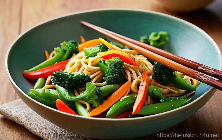 퓨전 치킨과 어울리는 사이드 추천 - **Vibrant Garlic Noodles and Stir-fried Vegetables:** A beautifully composed, top-down shot of a lar...